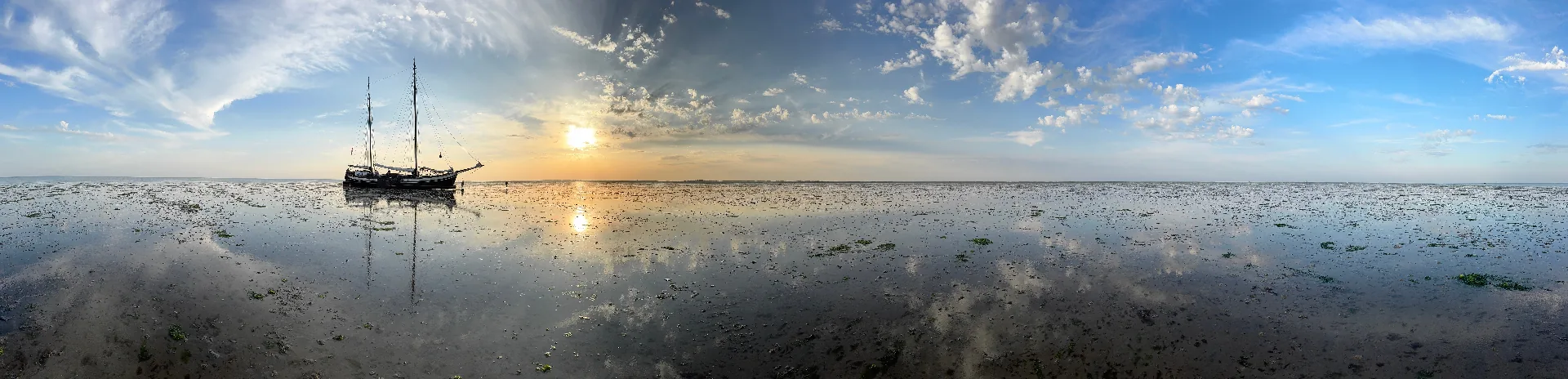 Panorama ship on mudflats